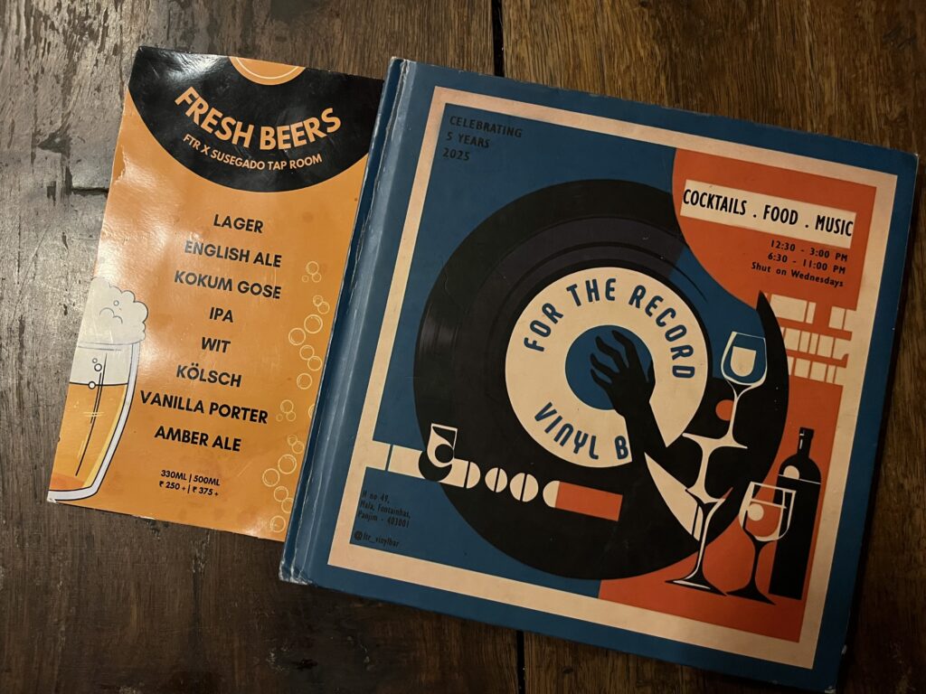Shot of For The Record Vinyl Bar's craft beer and food menus.