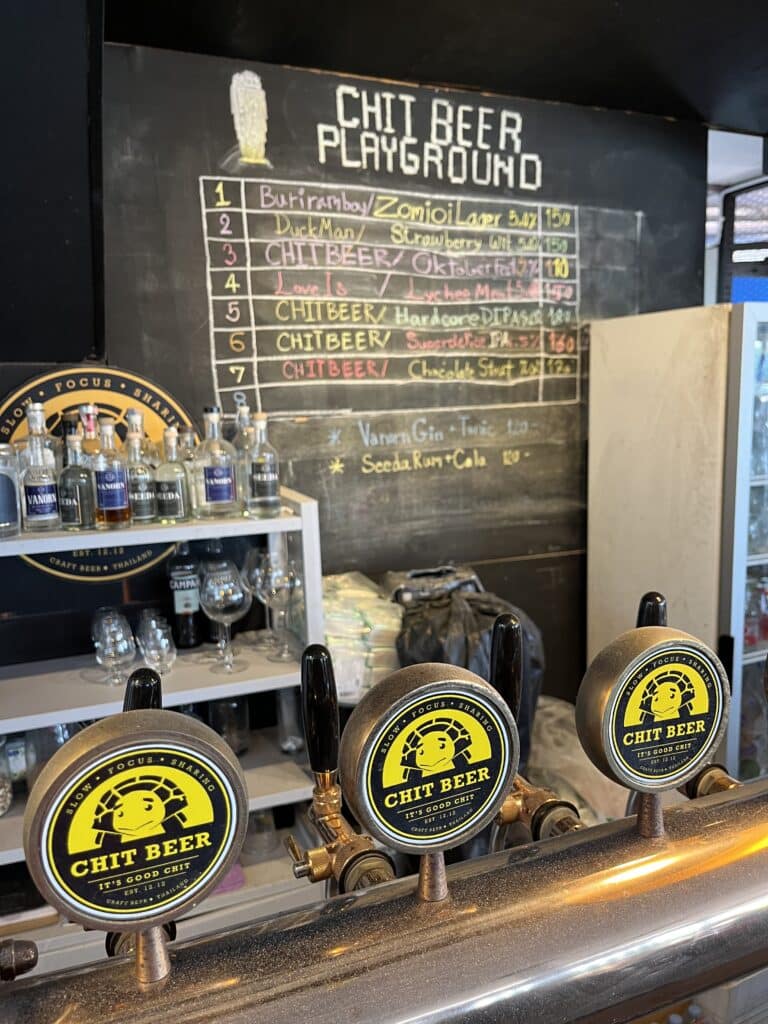 Chalk board listing craft beer selection at Chit Beer brewpub on Koh Kret in Bangkok, Thailand.