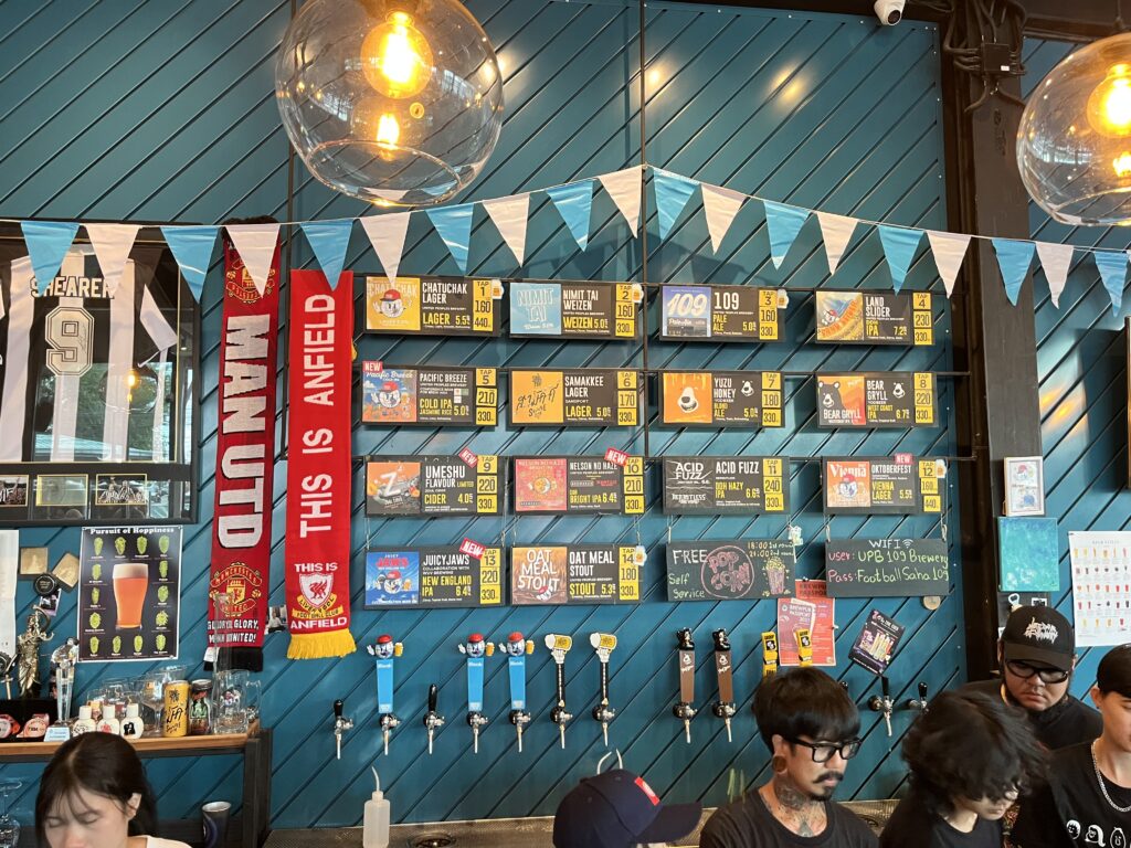 Tap selection at United Peoples Brewery in Bangkok, Thailand.