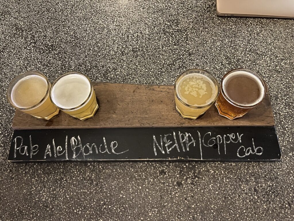 Taster flight consisting of 4 small glasses of beer at Pomme Brewhouse in Siem Reap, Cambodia.