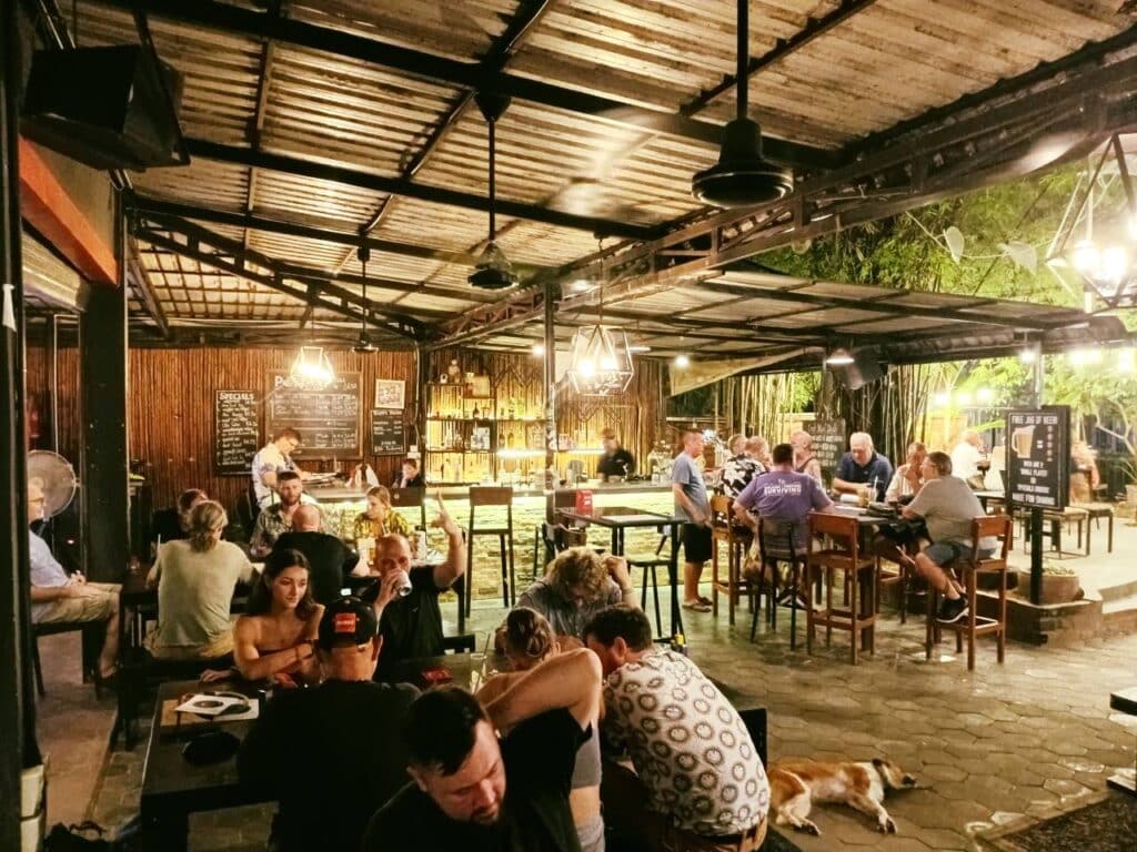 View of covered seating area at Pomme Brewhouse in Siem Reap, Cambodia.